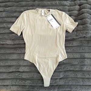 Lululemon Athletica Kids Beige Bodysuit